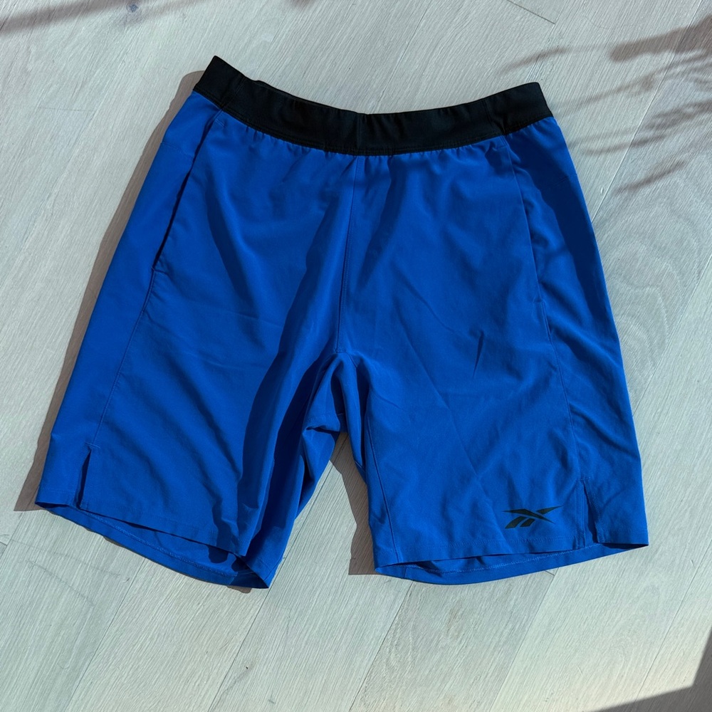 Reebok Men's Blue Athletic Speedwick Shorts with Black Waistband
